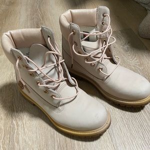 Worn a couple of times. A few scuffs that can come out. Too small for me.